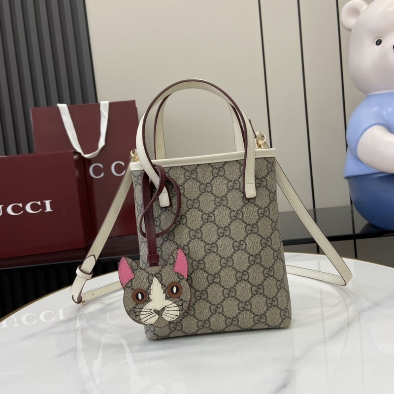 G*u*i top handle bags